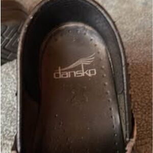 Dansko Woman’s Black clogs